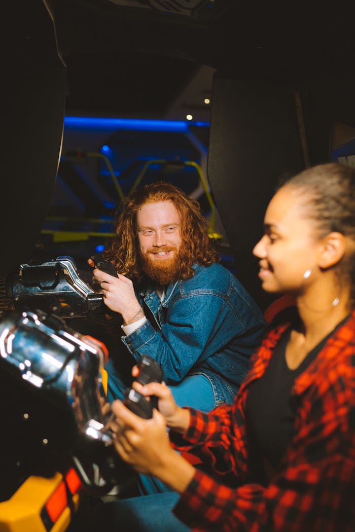 A Bearded Man Smiling while Looking at His Partner